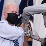 Biden gets COVID-19 booster shot before cameras, pushes vaccinations
